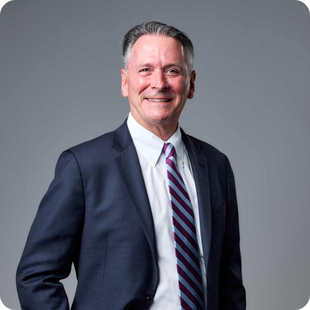A professional headshot of dr. Sean E. Bradley