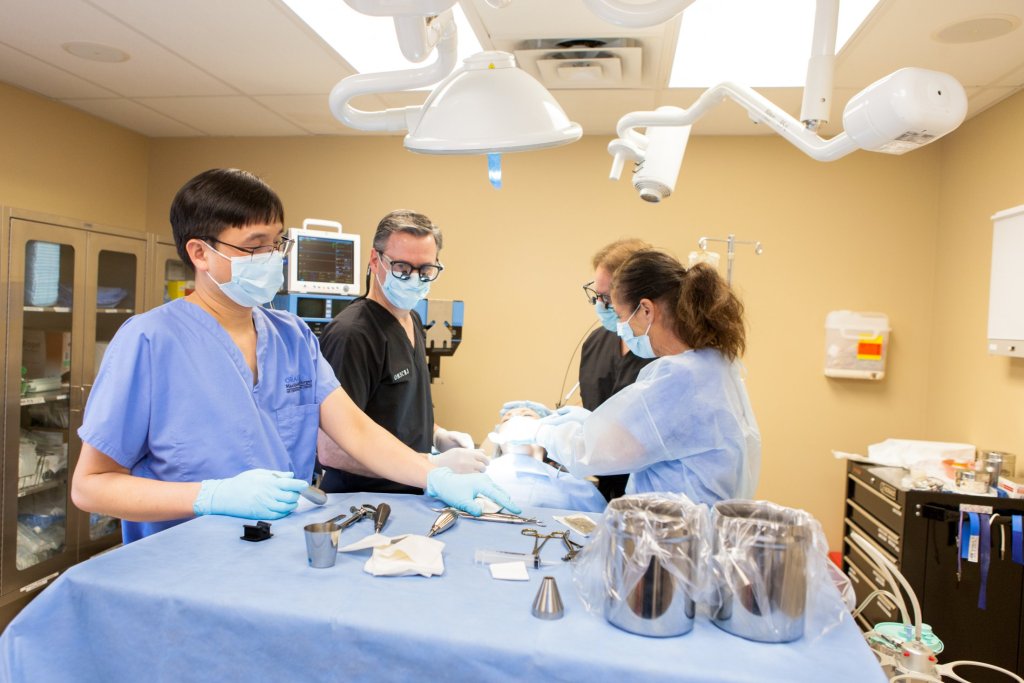 Staff looking over dental materials