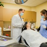 A patient with Dr. Sasportas and staff